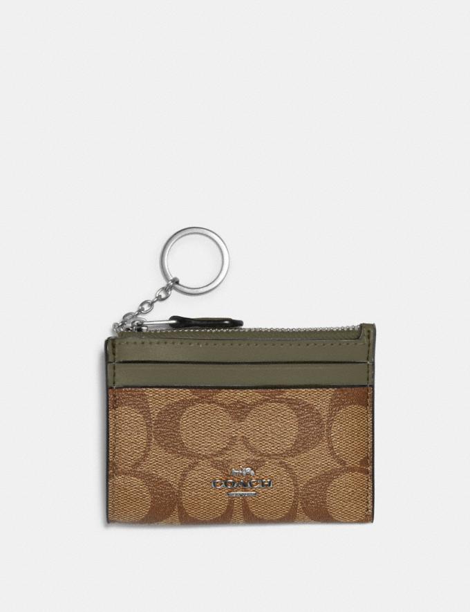 mini skinny id case in signature canvas brown